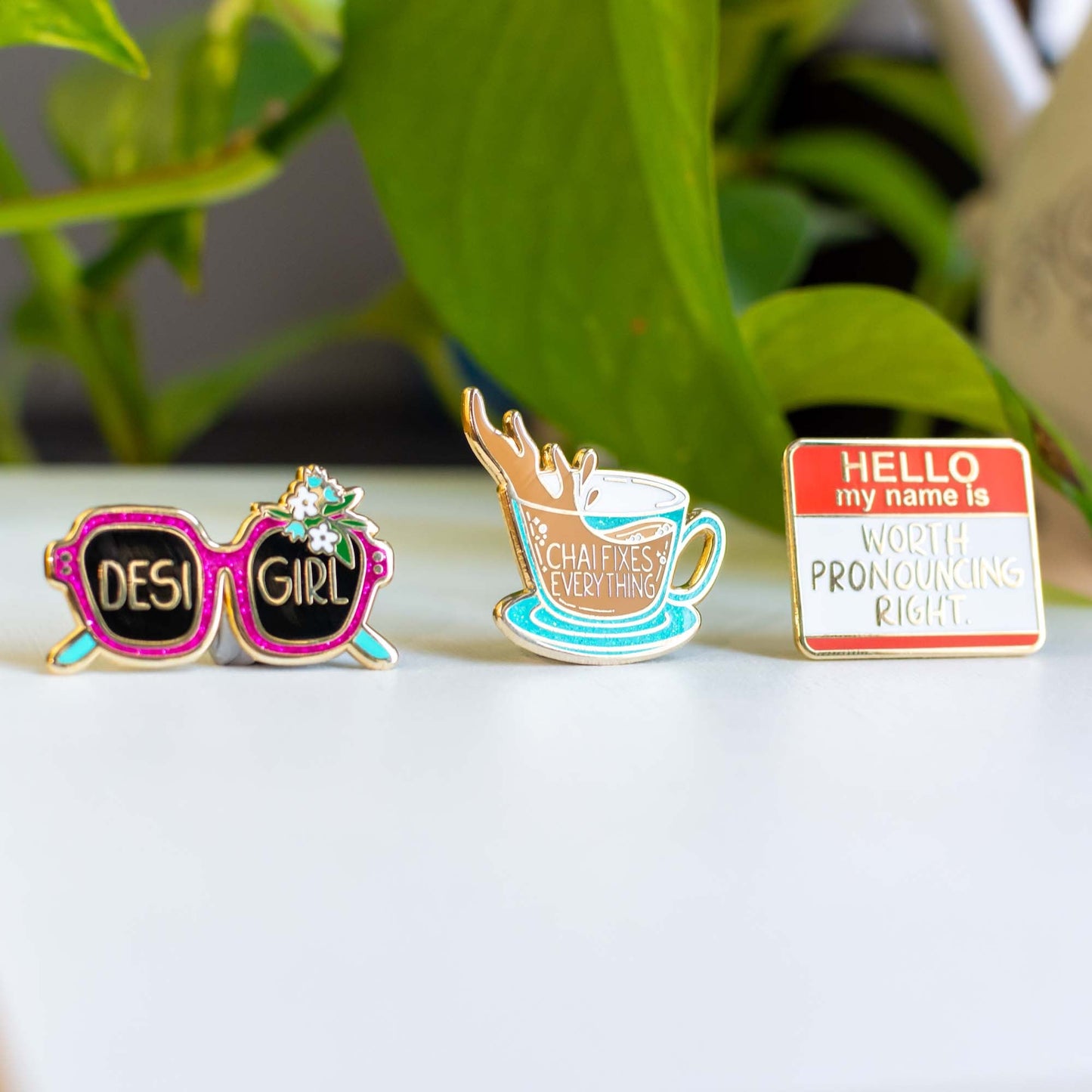 a couple of pins sitting on top of a table
