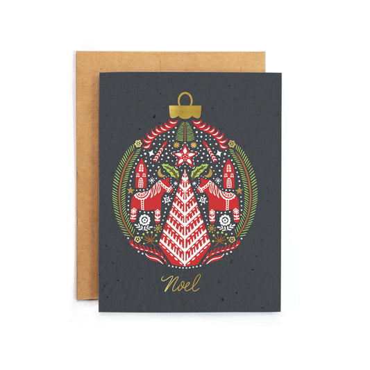 a card with a christmas ornament on it