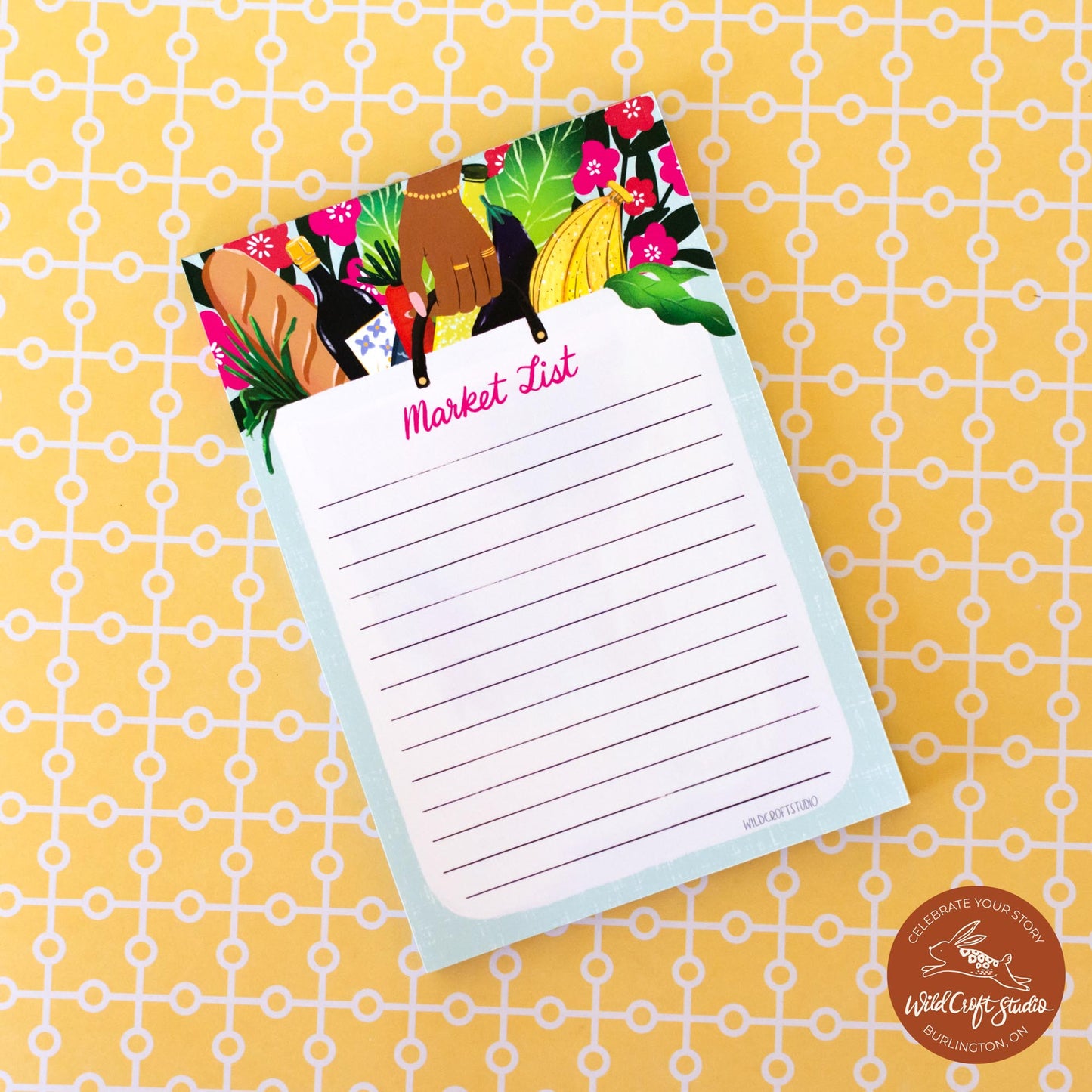 a notepad with a horse and flowers on it