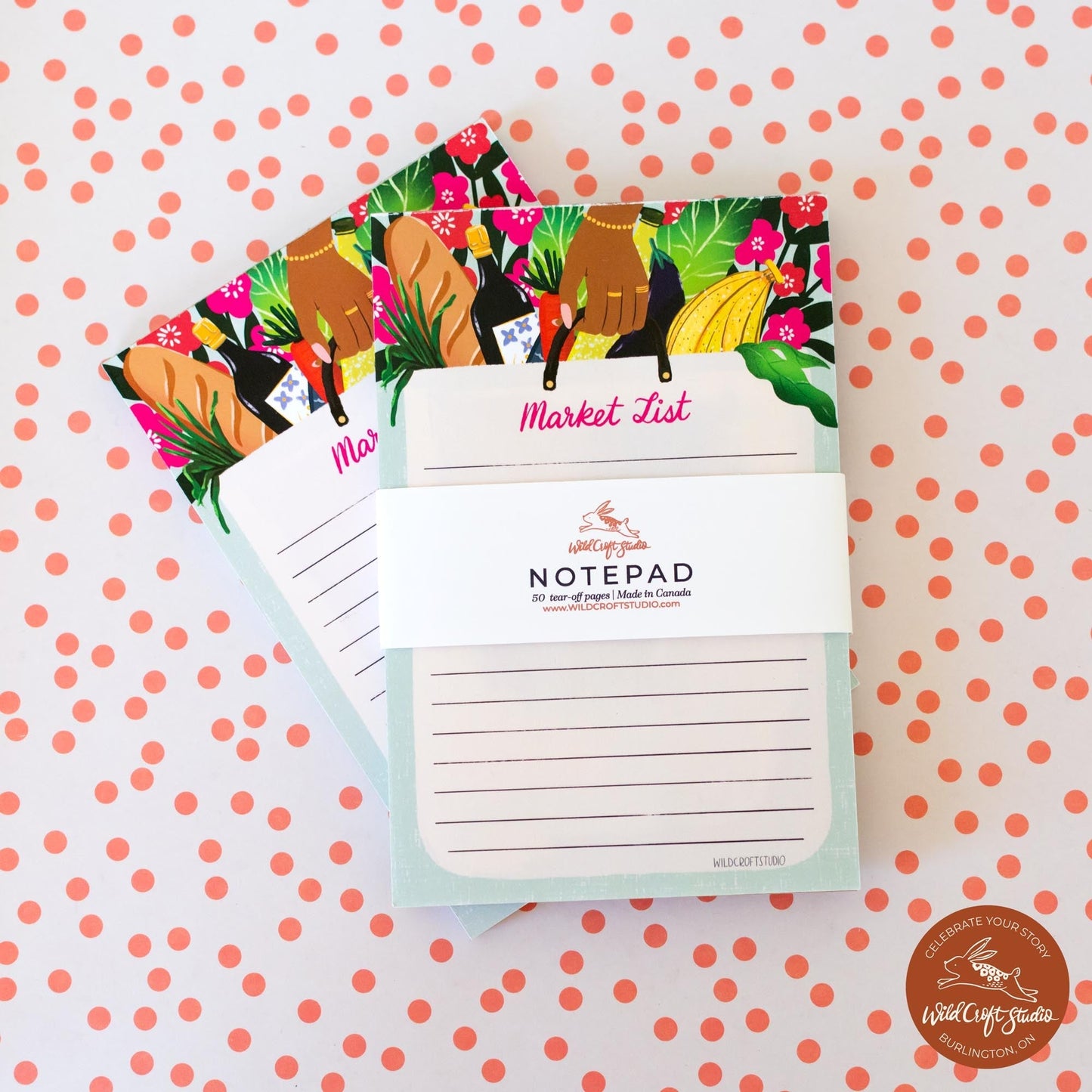 three notepads on top of each other on a table