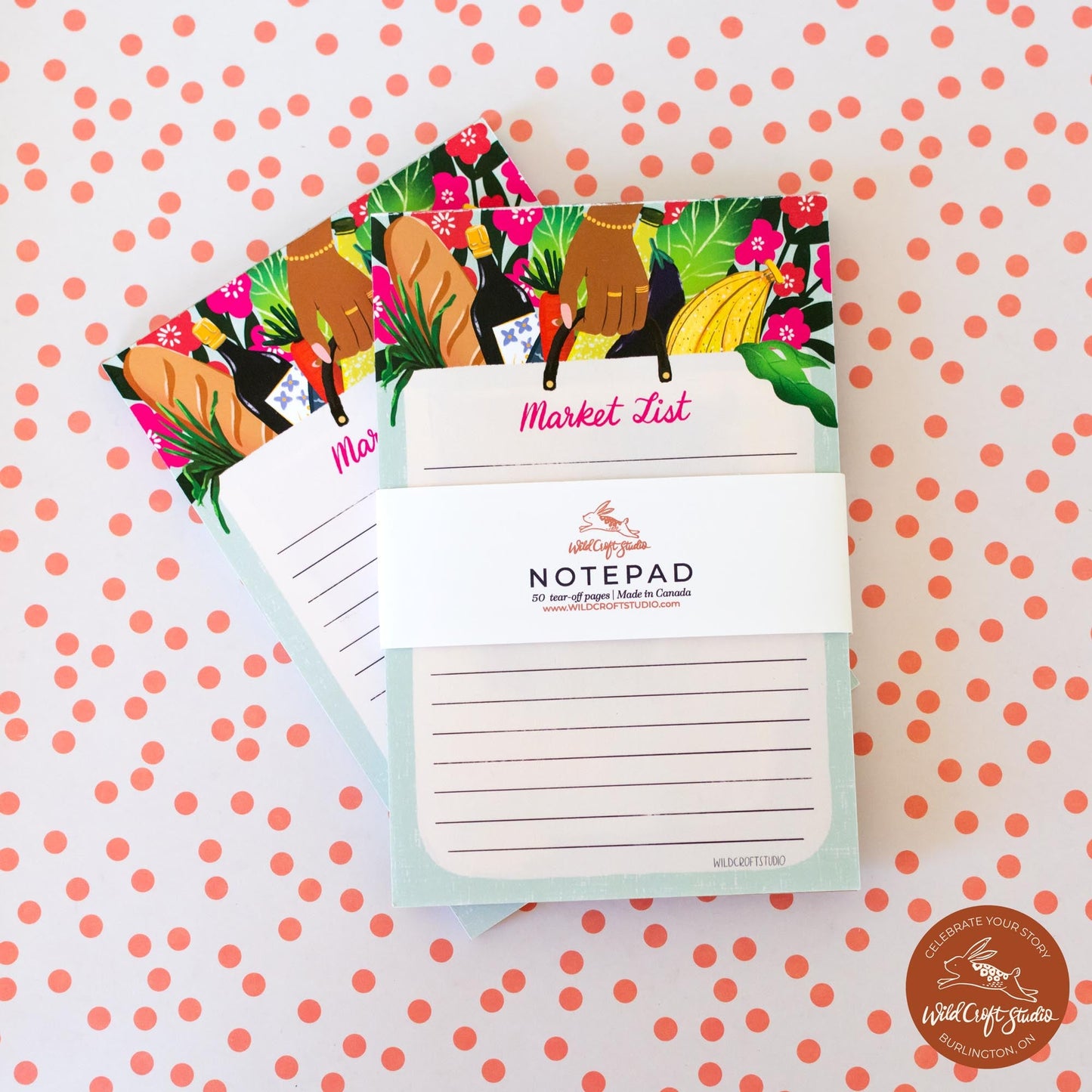three notepads on top of each other on a table