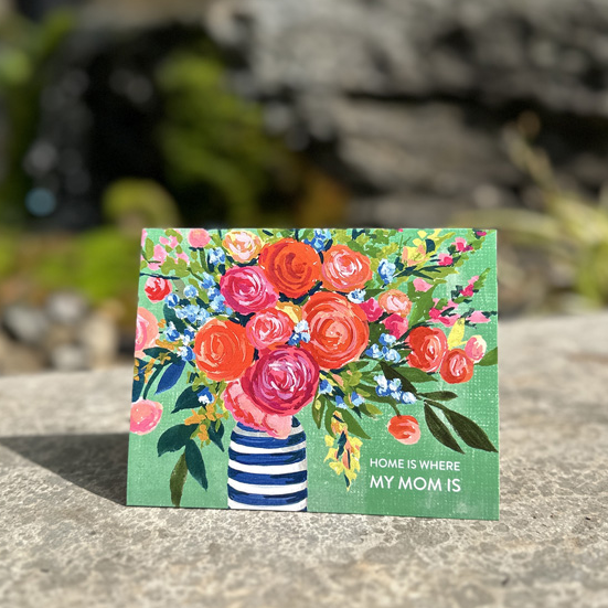 a card with a bouquet of flowers on it