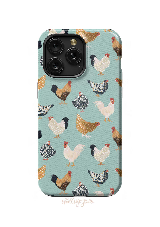 a phone case with chickens on a blue background