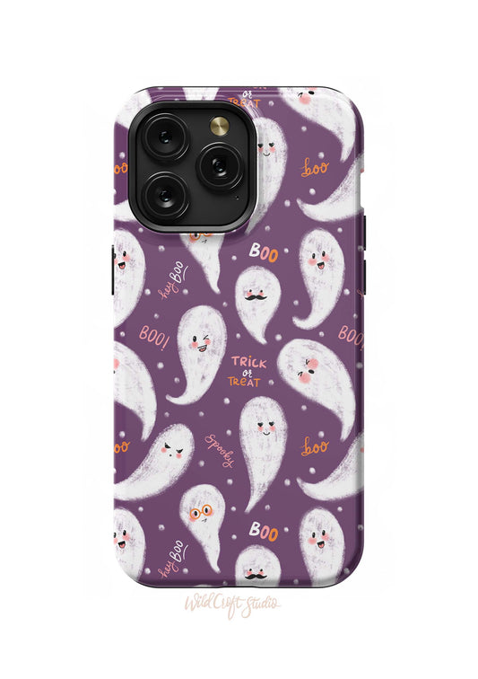 a purple phone case with ghost faces on it