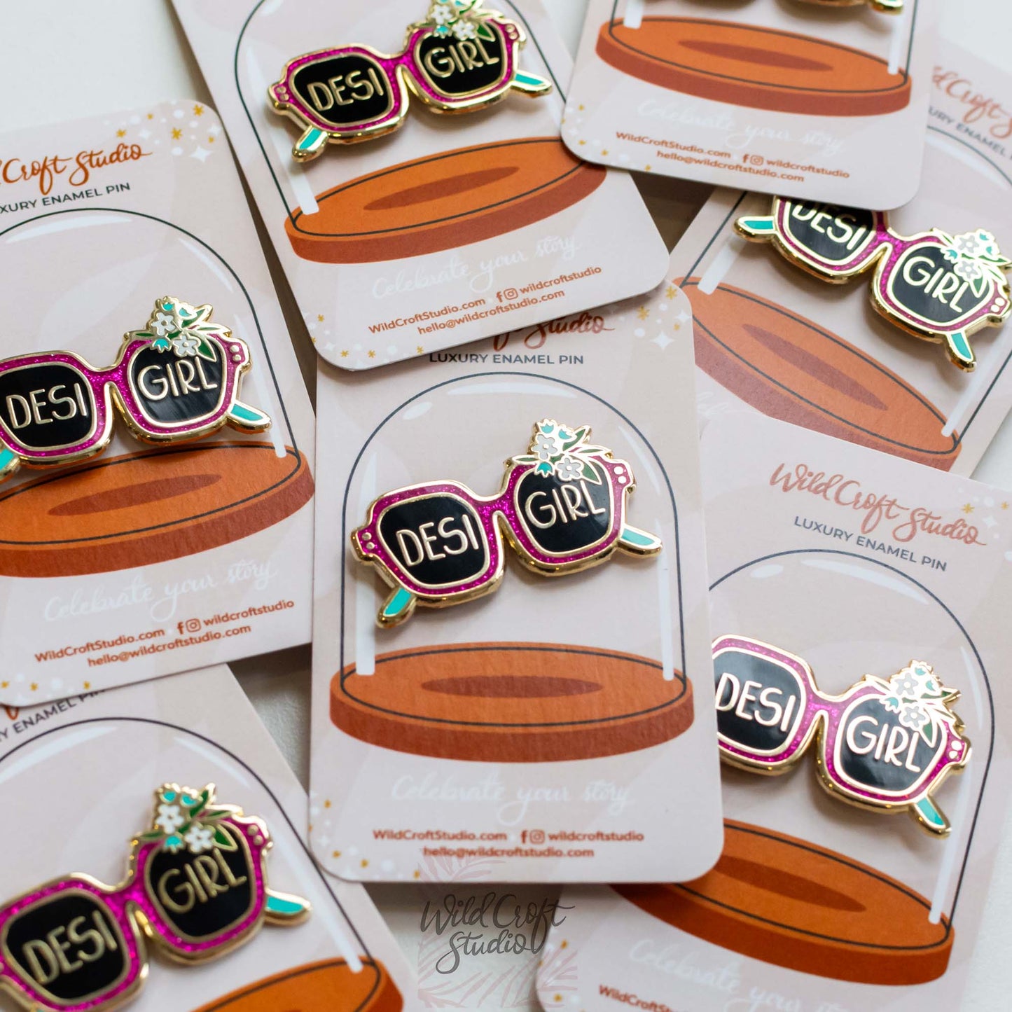 a bunch of pins that are on top of a card