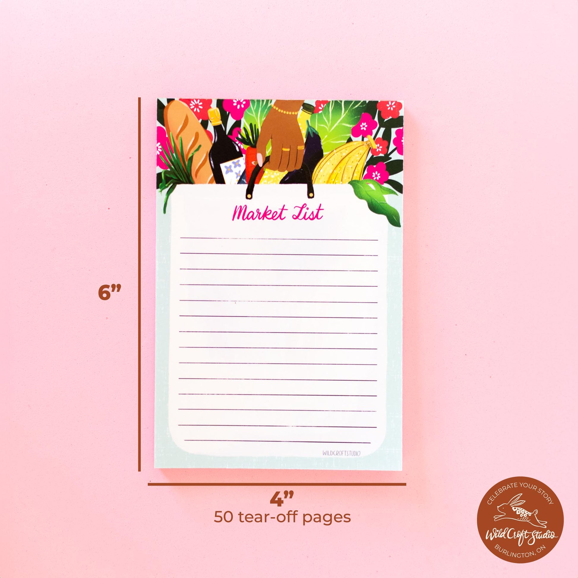 a notepad with a bunch of flowers on it