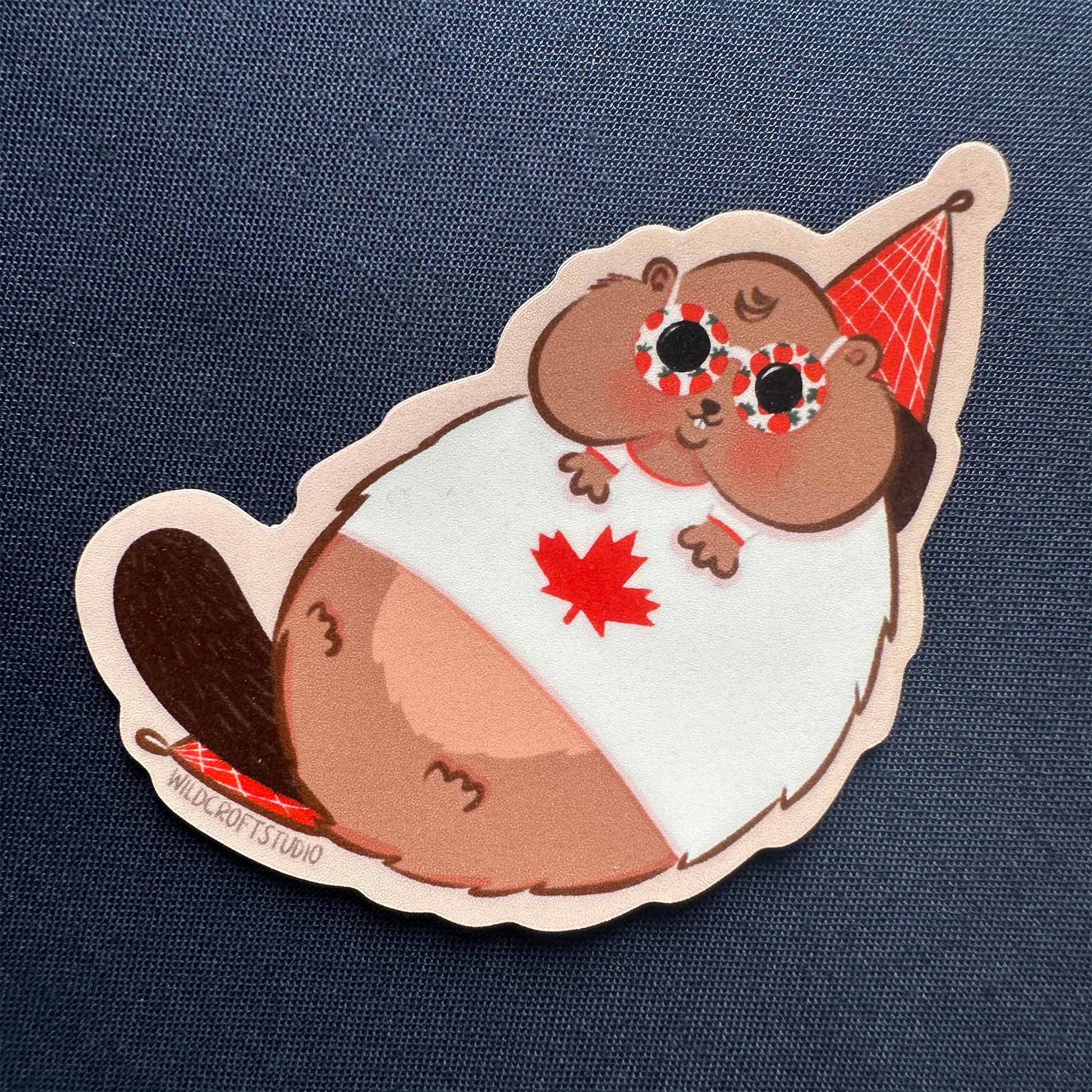 a sticker of a bear with a canadian flag on it