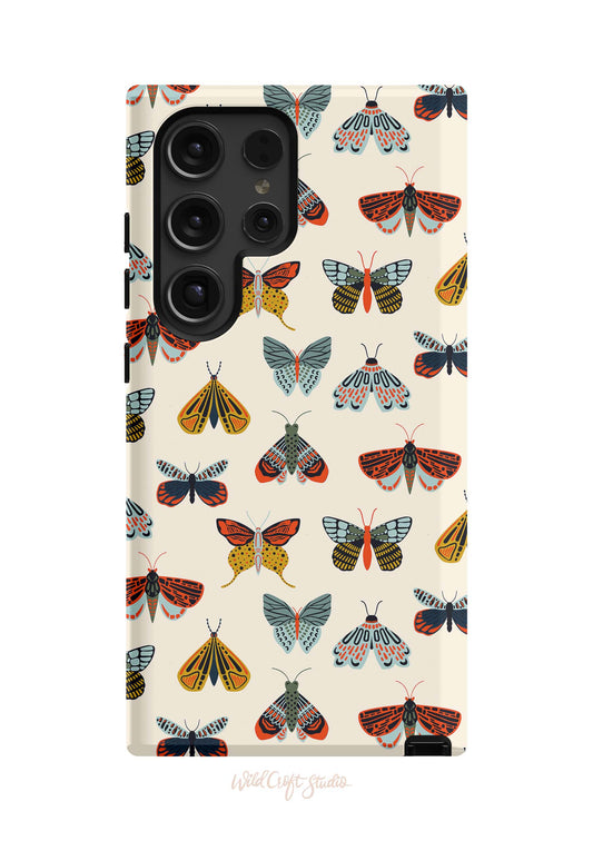 a phone case with moths on it