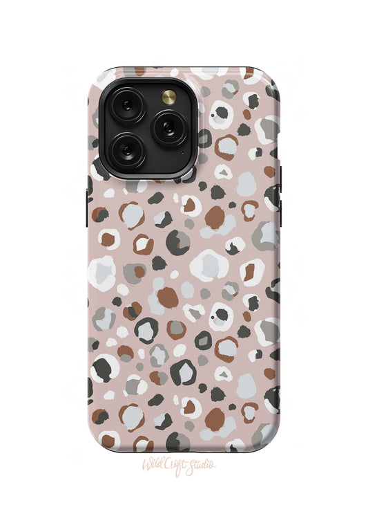 a pink phone case with an animal print