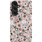 a pink phone case with a leopard print