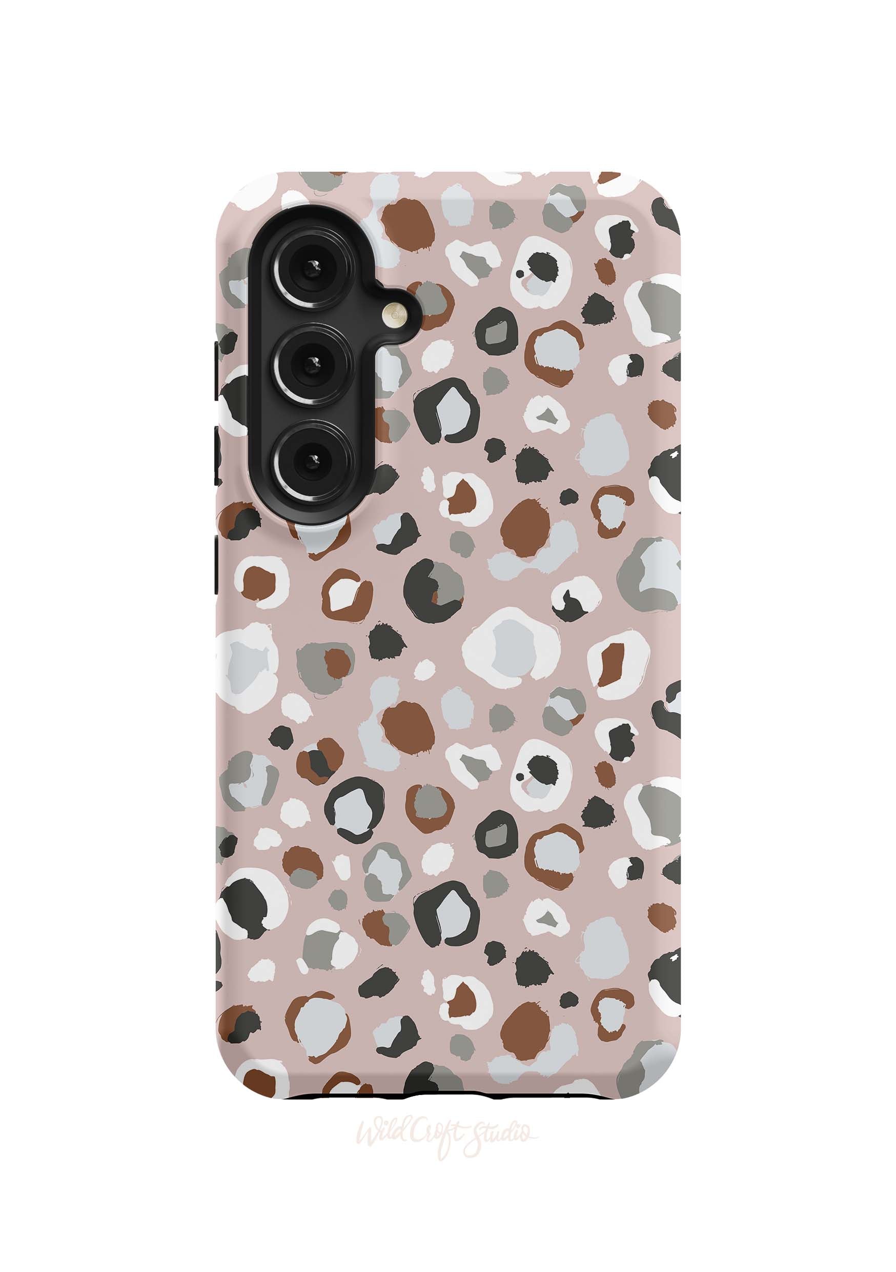 a pink phone case with a leopard print