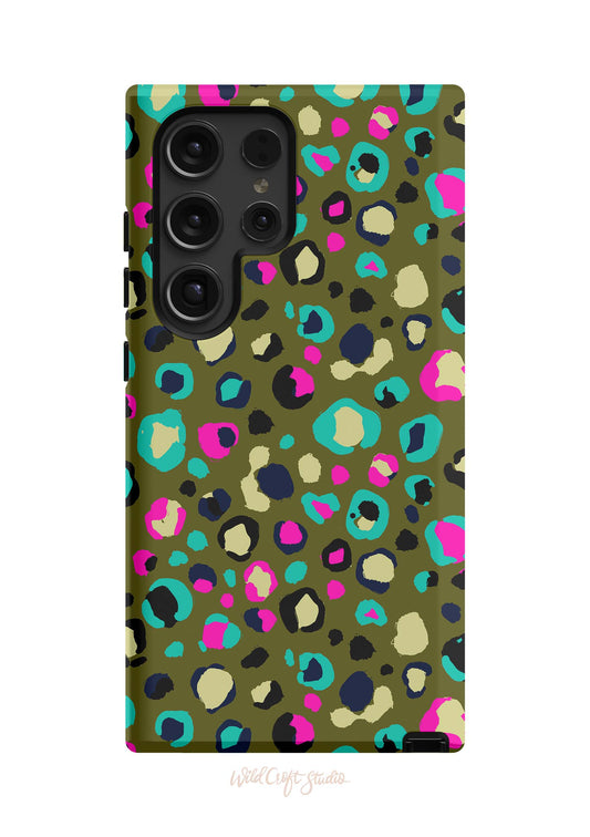 a green phone case with a multicolored animal print