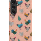 a pink phone case with colorful chickens on it
