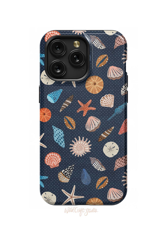 a phone case with shells and seashells on it