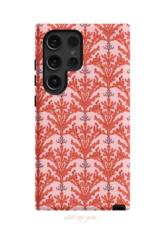 a red phone case with a pattern on it