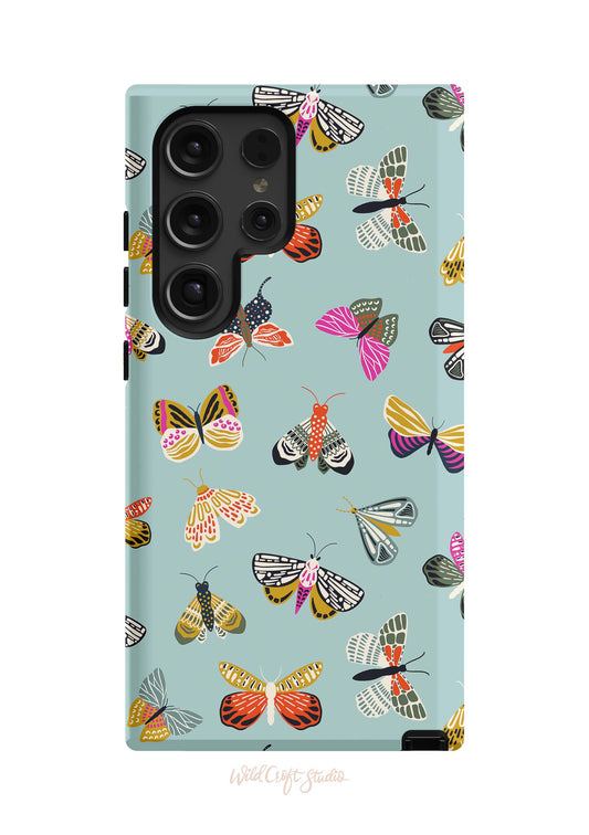 a blue phone case with colorful butterflies on it