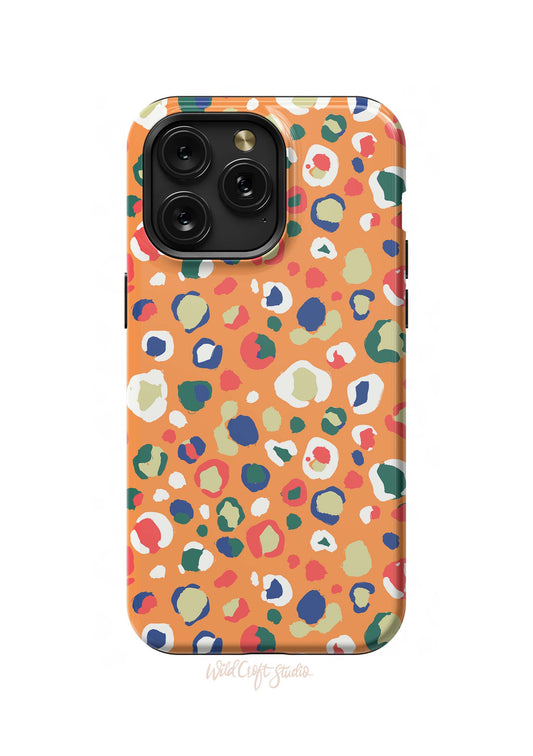 an orange phone case with a colorful animal print