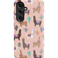 a pink phone case with llamas and cacti on it