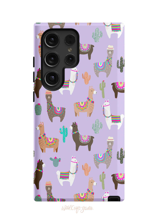 a purple phone case with llamas and cactuses on it