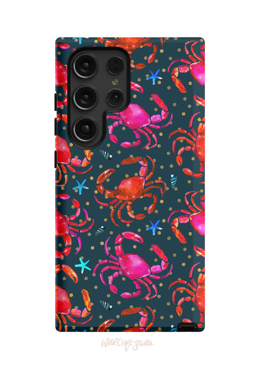 a phone case with colorful crabs on a black background
