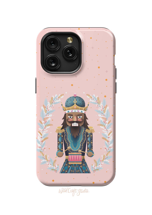 a pink phone case with a picture of a man wearing a crown