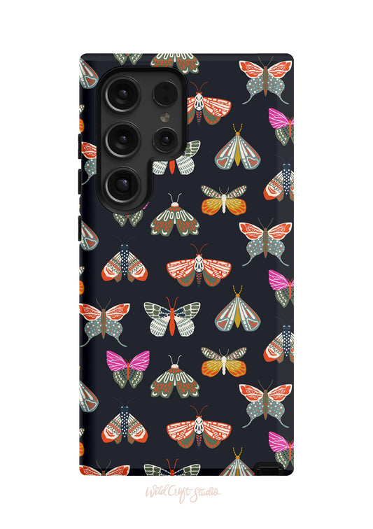 a black phone case with colorful moths on it